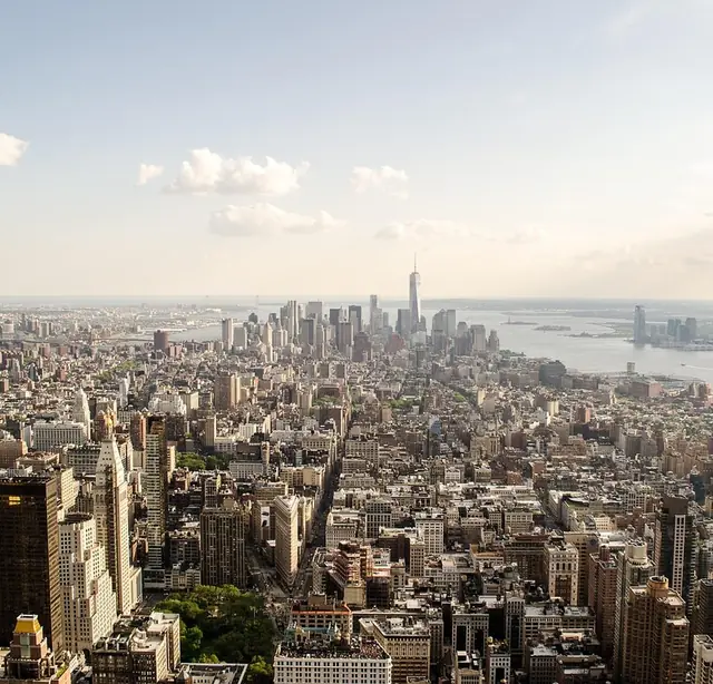 Aerial view of a dense financial district, the competitive market a peer analysis measures you against